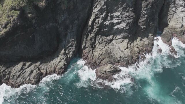 arieal big waves on the rocks