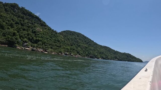 View of the sea and blue sky from inside the boat.