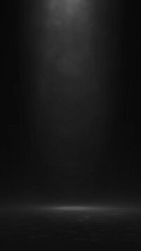 The studio background is black with smoky light.