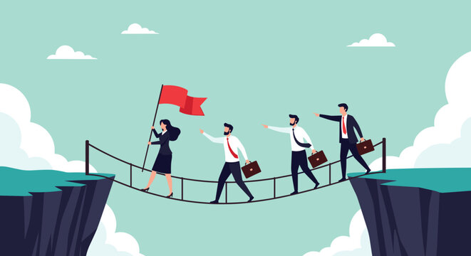 Team of business professionals following a female leader with a red flag across a bridge between two cliffs.