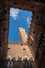 Obraz premium View of Palazzo Pubblico bell tower, Siena, Italy
