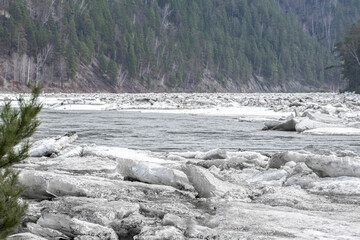 Spring ice drift on northern river with melting river ice and destruction of winter ice cover, climate change and global warming concept, natural landscape with cold water, drifting ice seasonal thaw © Vladimir Razgulyaev