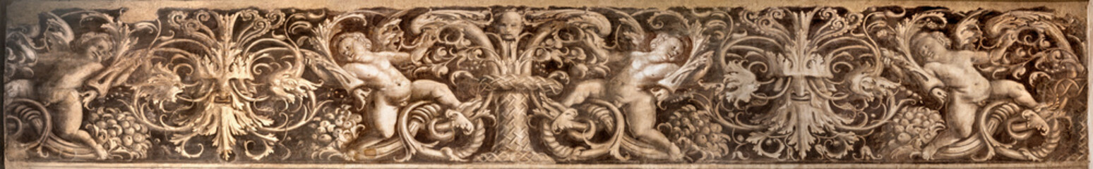 Naklejka premium VERCELLI, ITALY - JANUARY 16, 2026: The renaissance decorative fresco (grotesque) in the church Chiesa di San Cristoforo by Gaudenzio Ferrari (1529 - 1534).