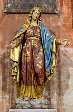VERCELLI, ITALY - JANUARY 16, 2026: The carved polychrome statue in the church Basilica di Sant Andrea by unknown artist. 