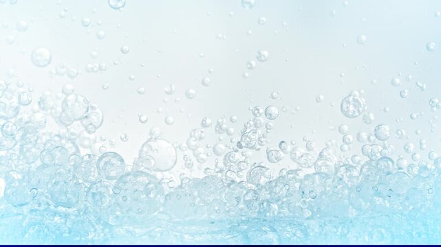 Super Slow Motion Shot of Oil Bubbles Floating in Water at 1000fps.