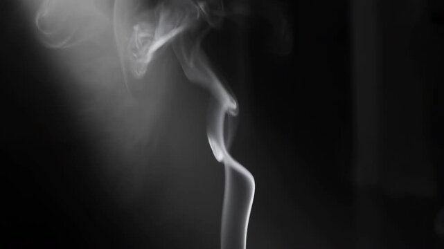 Ethereal Smoke Curls Ascend Gracefully. Mysterious Sky Of Drifting Smoke Illuminated By Studio Lighting