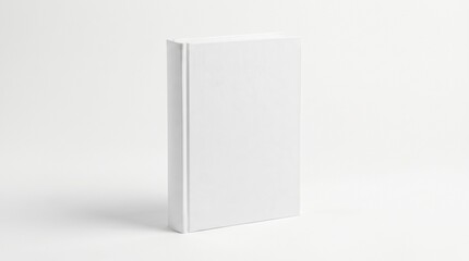 Fototapeta premium White hardcover book standing on plain surface against white background