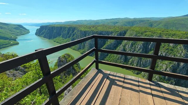 Wooden walkway overlooks deep, winding river valley. The Iron Gates (Djerdap Gorge). Balkans, Serbia.