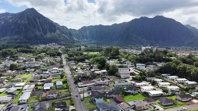 Residential homes in the town of Kaneohe with the Koolau mountains on the east side of Oahu in Hawaii. 