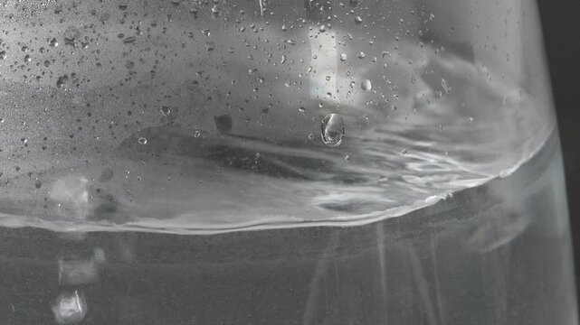 4K air bubbles forming and rising in clear water begins to boil, Physical transition of heating liquid.