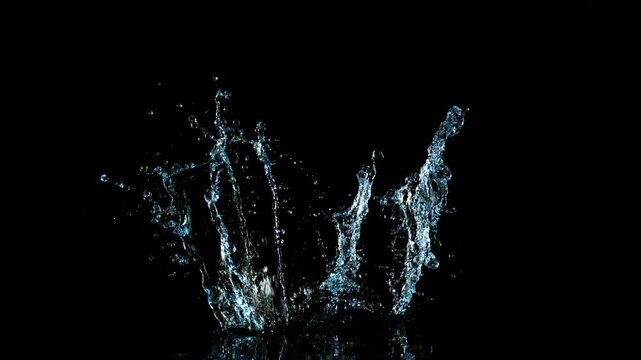 Super Slow Motion Shot of Water Splash Isolated on Black Background at 1000fps.