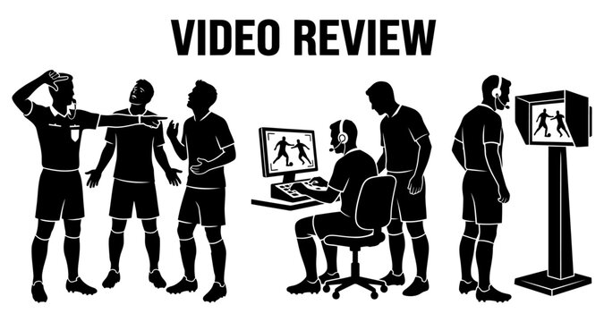 Soccer referees reviewing video assist technology during a match with a digital monitor and computer