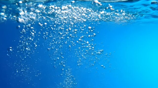 Bubbles Rising Through Clear Blue Water Underwater Scene 1.