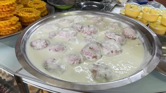Dahi vada. jalebi and ras malai sold in a Bengali shop in Kolkata.