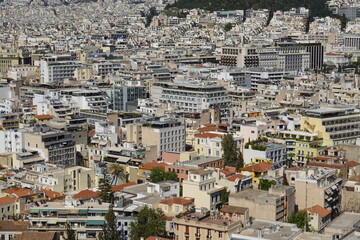 Fototapeta premium View of the bright city of Athens, Greece, in the Attica basin, on a clear spring day