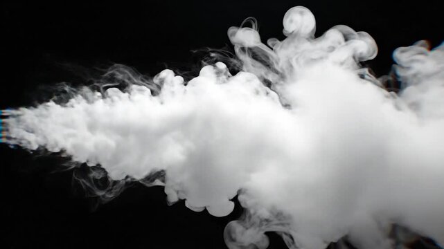 White smoke rises rapidly in a dense cloud formation against a dark background