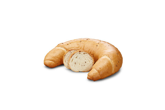 Freshly baked crescent bread with sliced caraway seeds