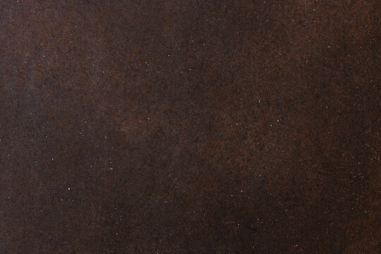 Rust metal texture background with dark weathered steel surface
