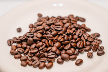 Fototapeta premium coffee beans in a cup