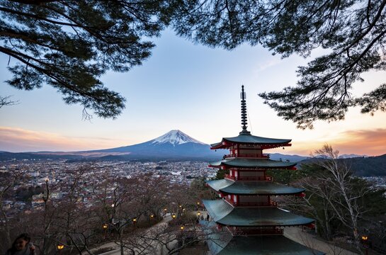 Five-story pagoda of a Shinto Shrine, Chureito Pagoda, with views of Fujiyoshida City and Mount Fuji volcano at sunset, Arakura Fuji Sengen Shrine, Arakurayama Sengen Park, Yamanashi Prefecture, Japan