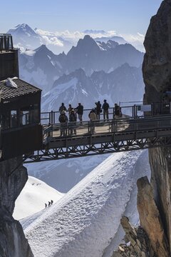 Tourists on viewing platform in front of mountains, mountain station, Aiguille du Midi, Mont Blanc massif, Chamonix, French Alps, France