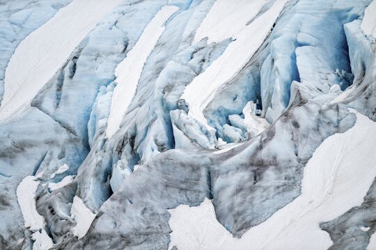 Blue rugged glacier ice with crevasses and snow, detail, Exit Glacier, Kenai Peninsula, Alaska, USA