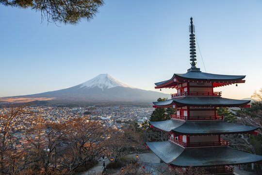 Five-story pagoda of a Shinto Shrine, Chureito Pagoda, with views of Fujiyoshida City and Mount Fuji volcano at sunset, Arakura Fuji Sengen Shrine, Arakurayama Sengen Park, Yamanashi Prefecture, Japan
