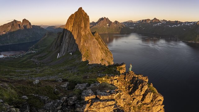 Steep mountain Segla, fjord Mefjorden with mountains, island Senja, Troms, Norway