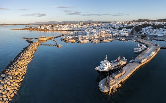 Evening atmosphere, aerial view, town view and harbour of Naoussa, harbour wall with Venetian ruins, Paros, Cyclades, Greece
