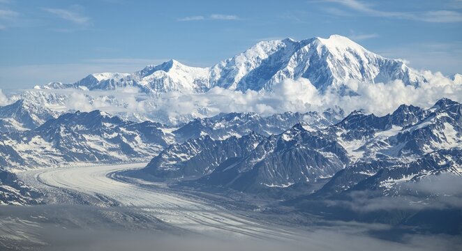 Clouds over high mountains, Mt Foraker with Kahlitna Glacier, aerial view, Alaska Range, Denali National Park, Alaska, USA