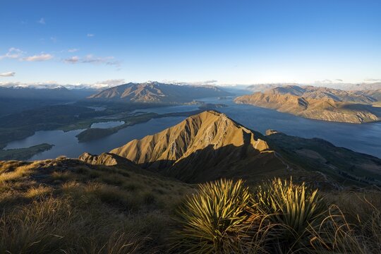 View of mountains and lake from Mount Roy, Roys Peak at sunset, Lake Wanaka, Southern Alps, Otago, South Island, New Zealand