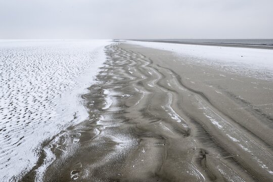 North Sea beach in snow, Langeoog, Lower Saxony, Germany