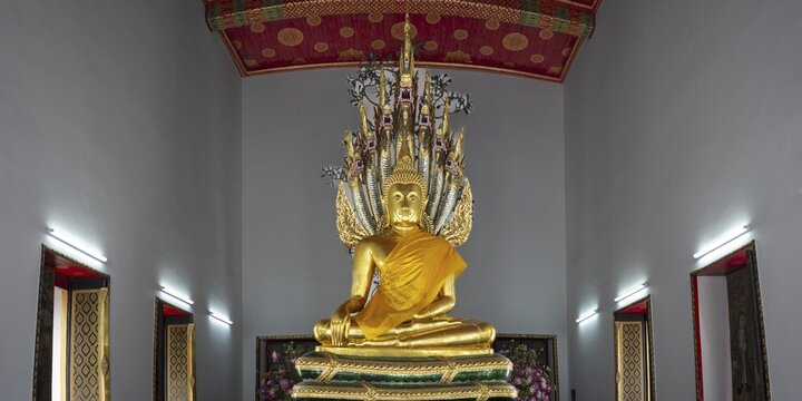 Gilded Buddha statue, Bhumispara-mudra, Buddha Gautama at the moment of enlightenment, Wat Pho, Bangkok, Thailand