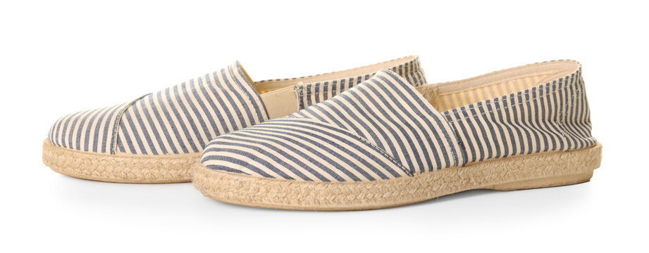 Pair of stylish espadrille shoes isolated on white