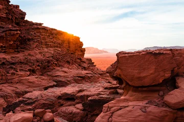 Fotobehang Bordeaux Cinematic Landscape of a Red Wadi Rum at Sunset  © Jacqueline