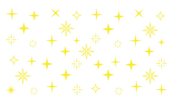 Yellow star and cross symbols float in air against a plain white background with various shapes and sizes on display