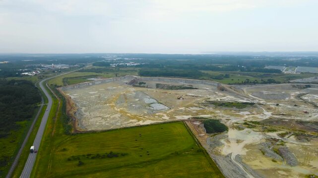 Aerial View of a Large Limestone Quarry Mine With Heavy Machinery