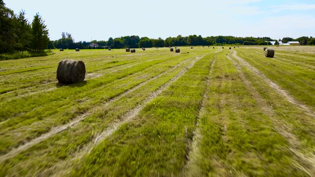 Low Altitude Aerial Flight Over and Between Silage Hay Bales in a Rural Farm Field