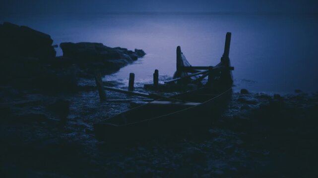 Old wreck resting on pebbles, halfsubmerged timbers and broken ribs silhouetted against dim sea, textured foreground stones and moody blue grading evoke mystery