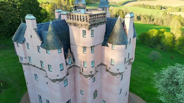 Cinematic Drone Shot of Craigievar Castle: Aerial View of the Pink Fairy Tale Fortress in Scotland