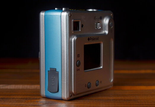 PERPIGNAN, FRANCE - MAY 11, 2026: A Polaroid PDC 3070 compact digital camera on a wooden surface. Vintage point and shoot camera from the early 2000s is a classic example of retro digital technology
