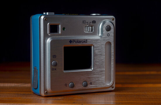 PERPIGNAN, FRANCE - MAY 11, 2026: A Polaroid PDC 3070 compact digital camera on a wooden surface. Vintage point and shoot camera from the early 2000s is a classic example of retro digital technology