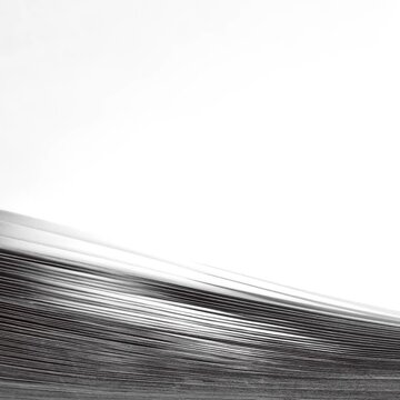 Fast flipping book pages side view close up black and white monochrome
