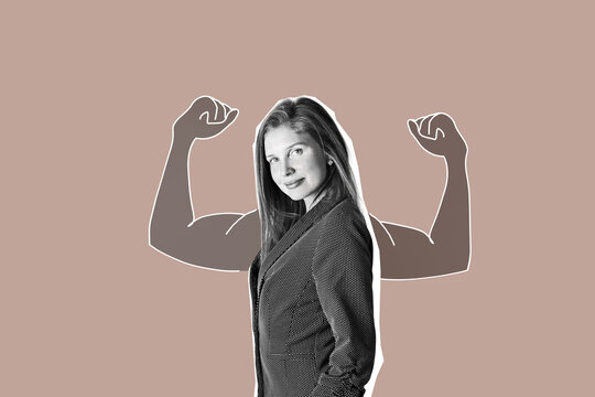  Confident young businesswoman smiling at the camera and shows muscle on isolated white background.