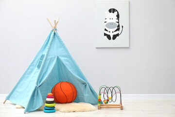 Wigwam, toys and picture in child's room © New Africa