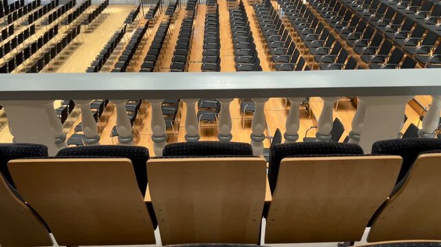 Empty seats in a concert hall or town hall or conference