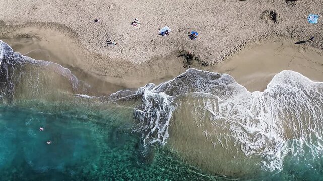 aerial view of Playa del Duque beach, San Andres village and mountains of Tenerife.