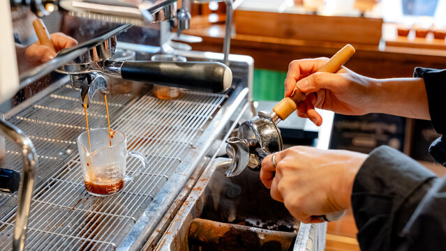Barista preparing espresso in a South Korean cafe