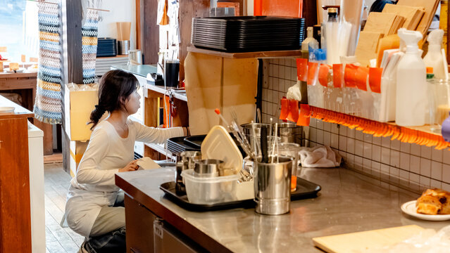 Coffee shop scene in South Korea with staff at work