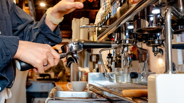 Barista preparing espresso in South Korean coffee shop